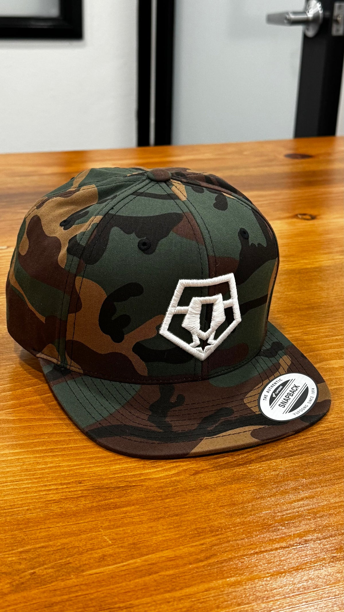 TIS Snap Back Camo Cap (White Logo)