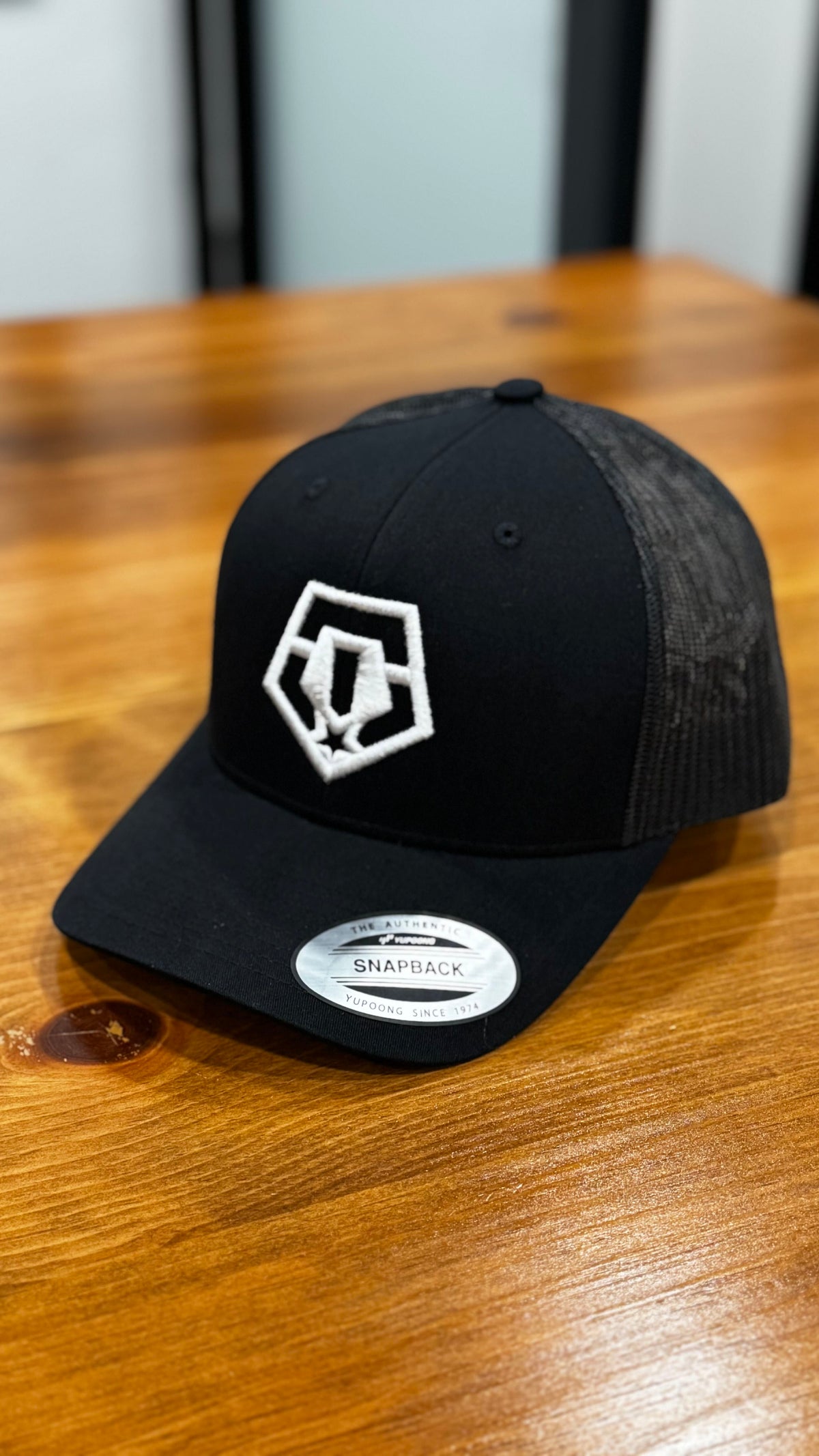 TIS Black Trucker Cap (White Logo)